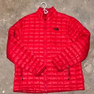 The North Face Red Thermoball Puffer.